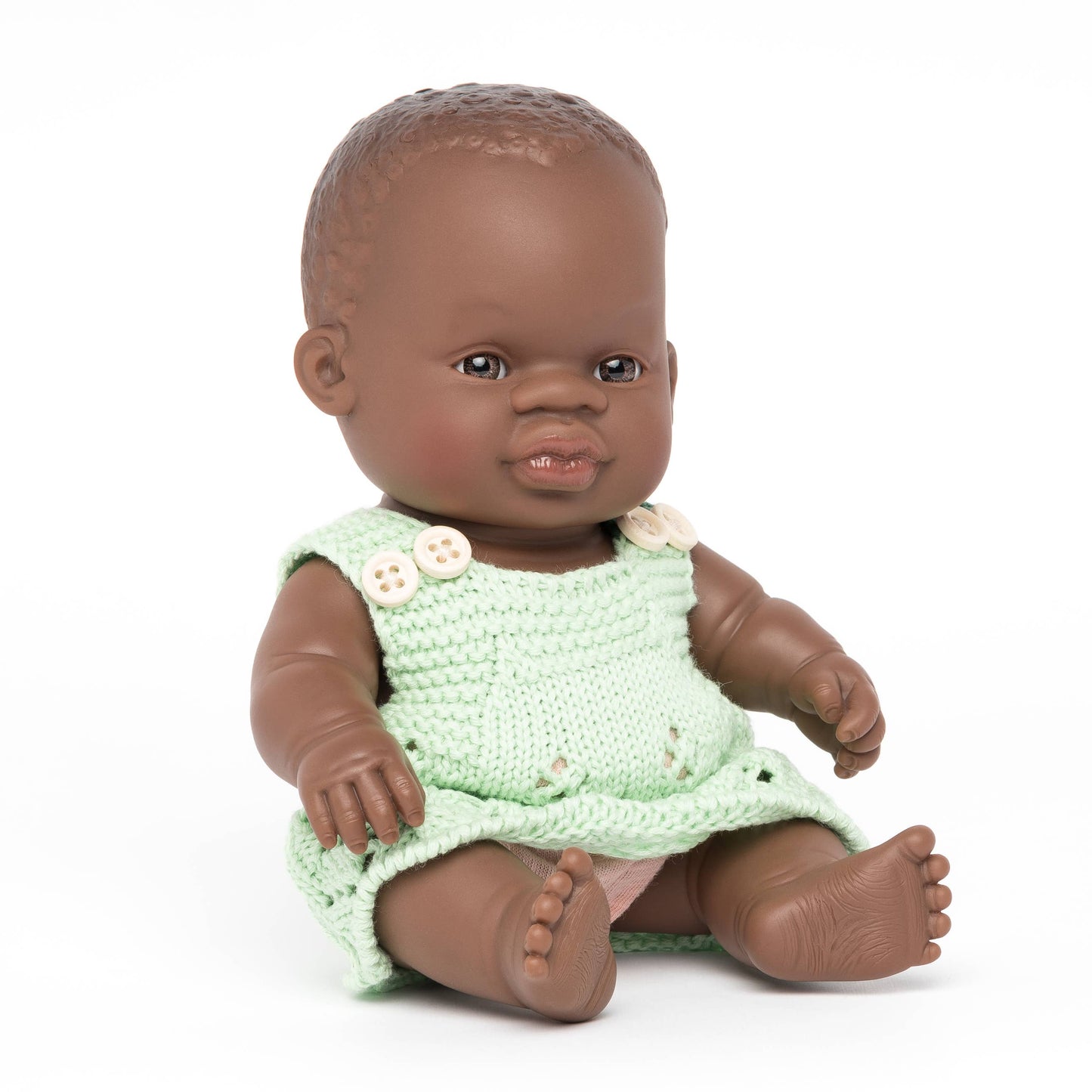 Miniland Educational - Dressed African Baby Girl Doll - 8 1/4"